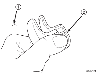 Fig. 103 Coat Hook Removal