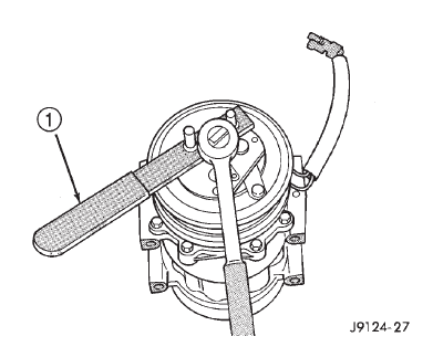 Fig. 26 Clutch Nut Remove