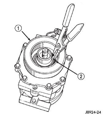 Fig. 31 Clutch Field Coil Snap Ring Remove
